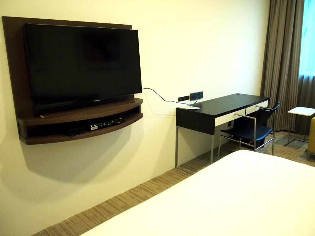 Cove D'Arena Aparthotel Singapura Quarto foto