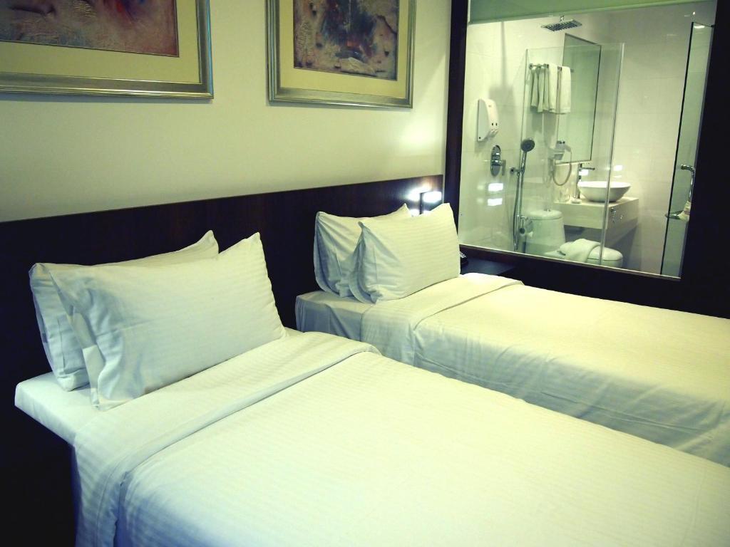 Cove D'Arena Aparthotel Singapura Quarto foto