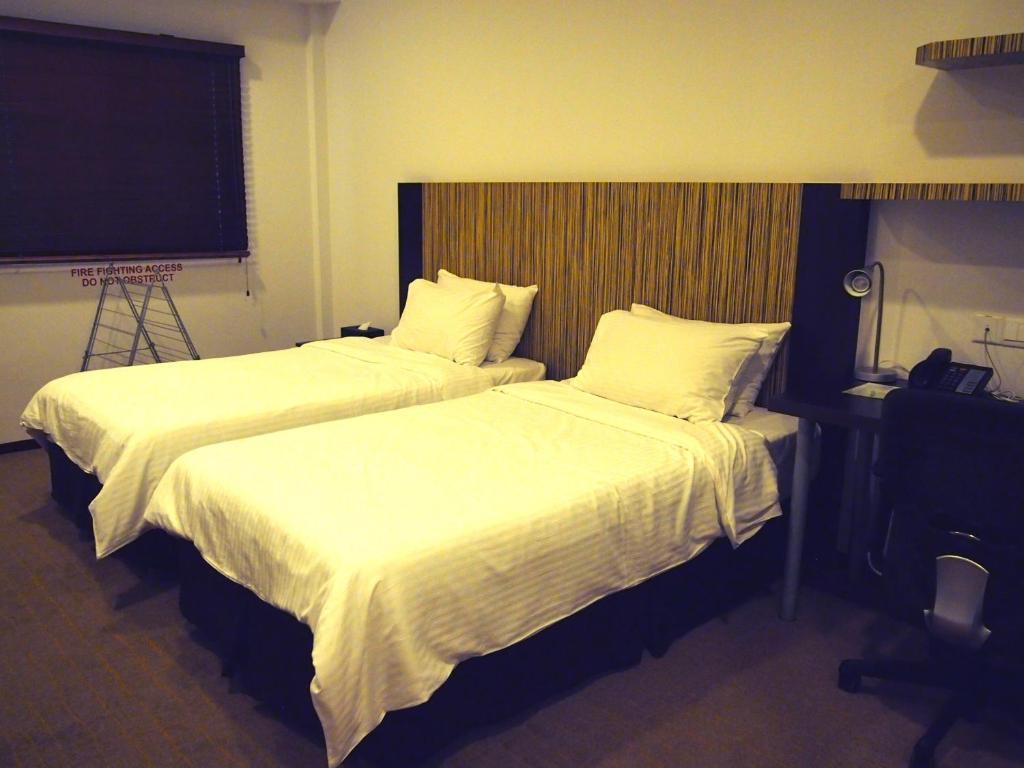 Cove D'Arena Aparthotel Singapura Quarto foto