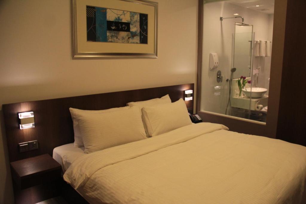 Cove D'Arena Aparthotel Singapura Quarto foto